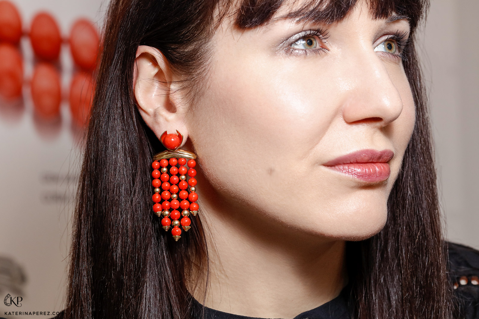 Katerina Perez wearing Assael Sardinian coral and yellow gold earrings