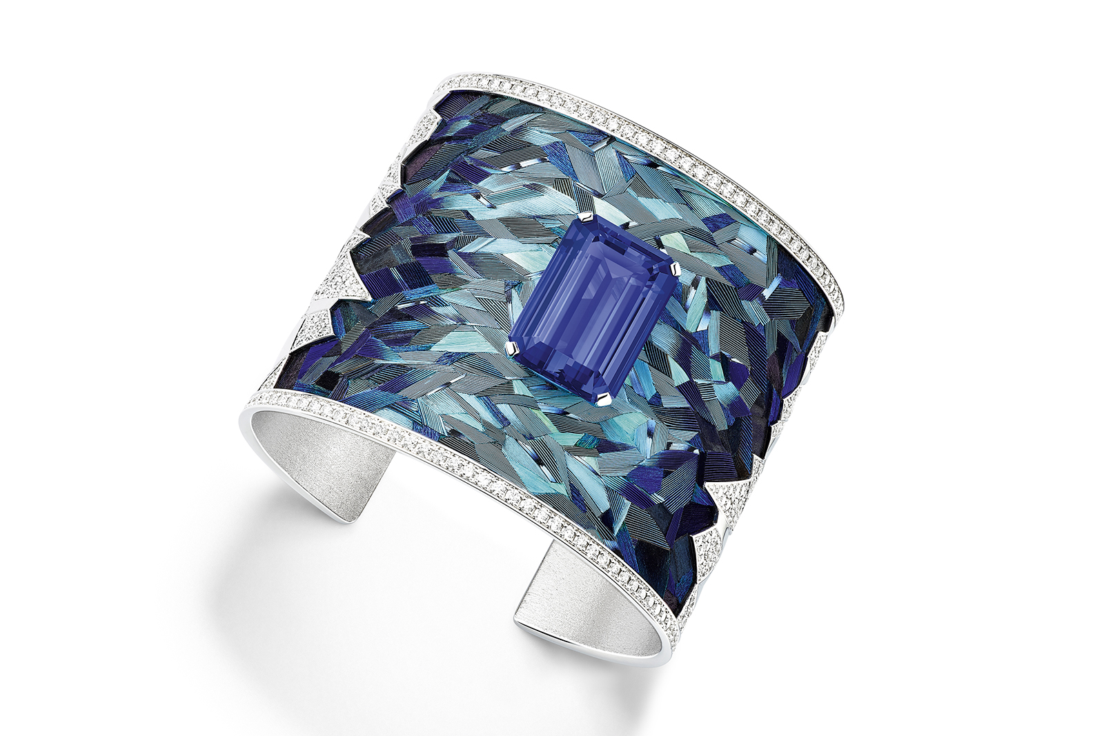  Piaget 'Blue Emotion' manchette cuff from the 'Exalting Sights' line with 24.36ct emerald cut tanzanite, 9.45ct diamonds and feather marquetry in white gold