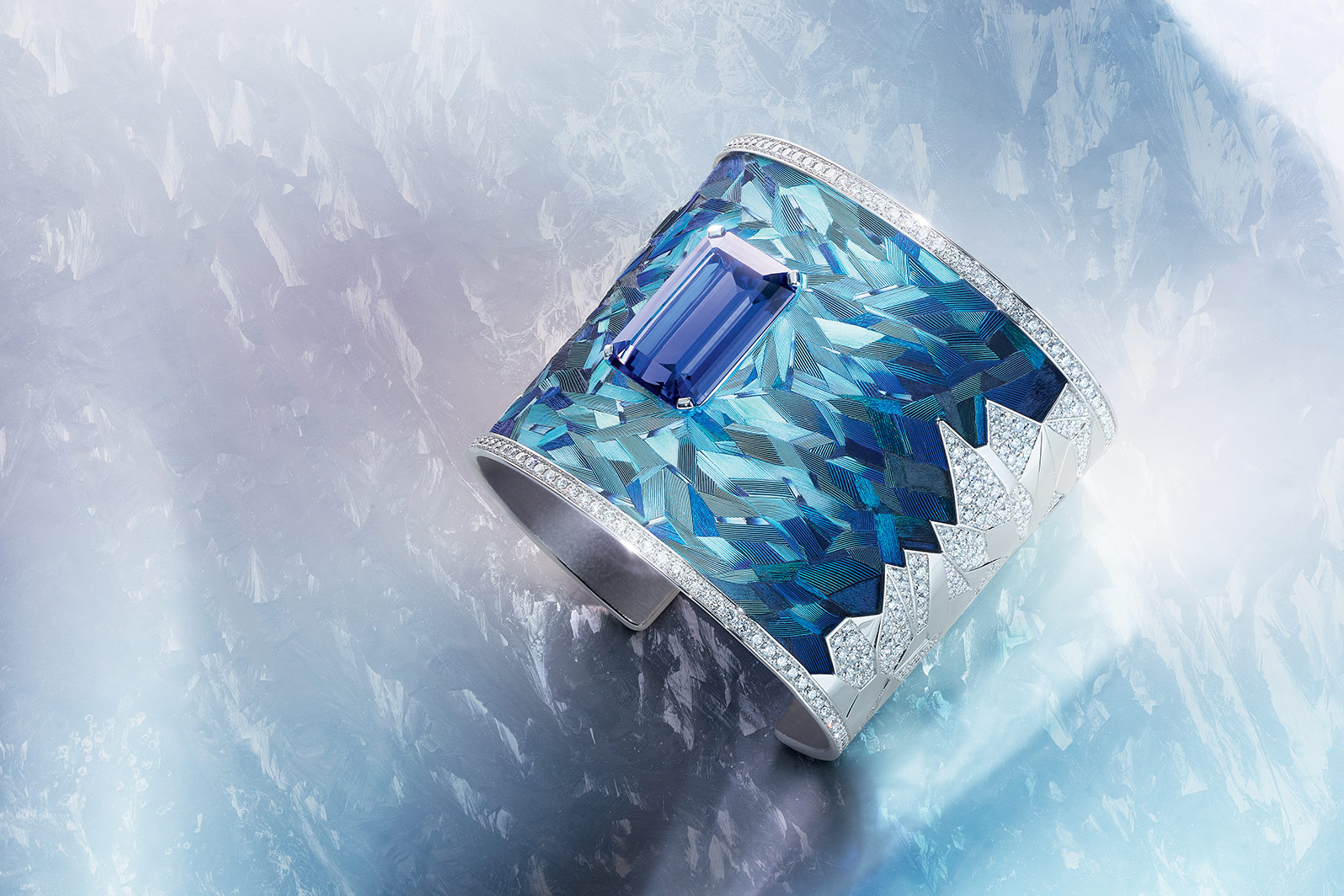  Piaget 'Blue Emotion' manchette cuff from the 'Exalting Sights' line with 24.36ct emerald cut tanzanite, 9.45ct diamonds and feather marquetry in white gold