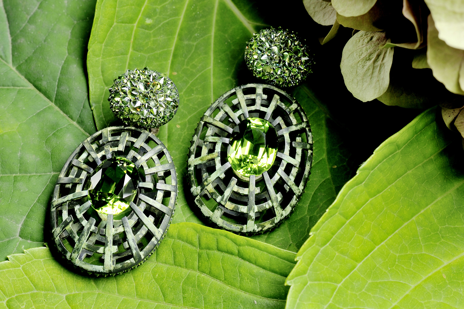 Hemmerle earrings with demantoids, peridots, white gold, silver courtesy of Hemmerle