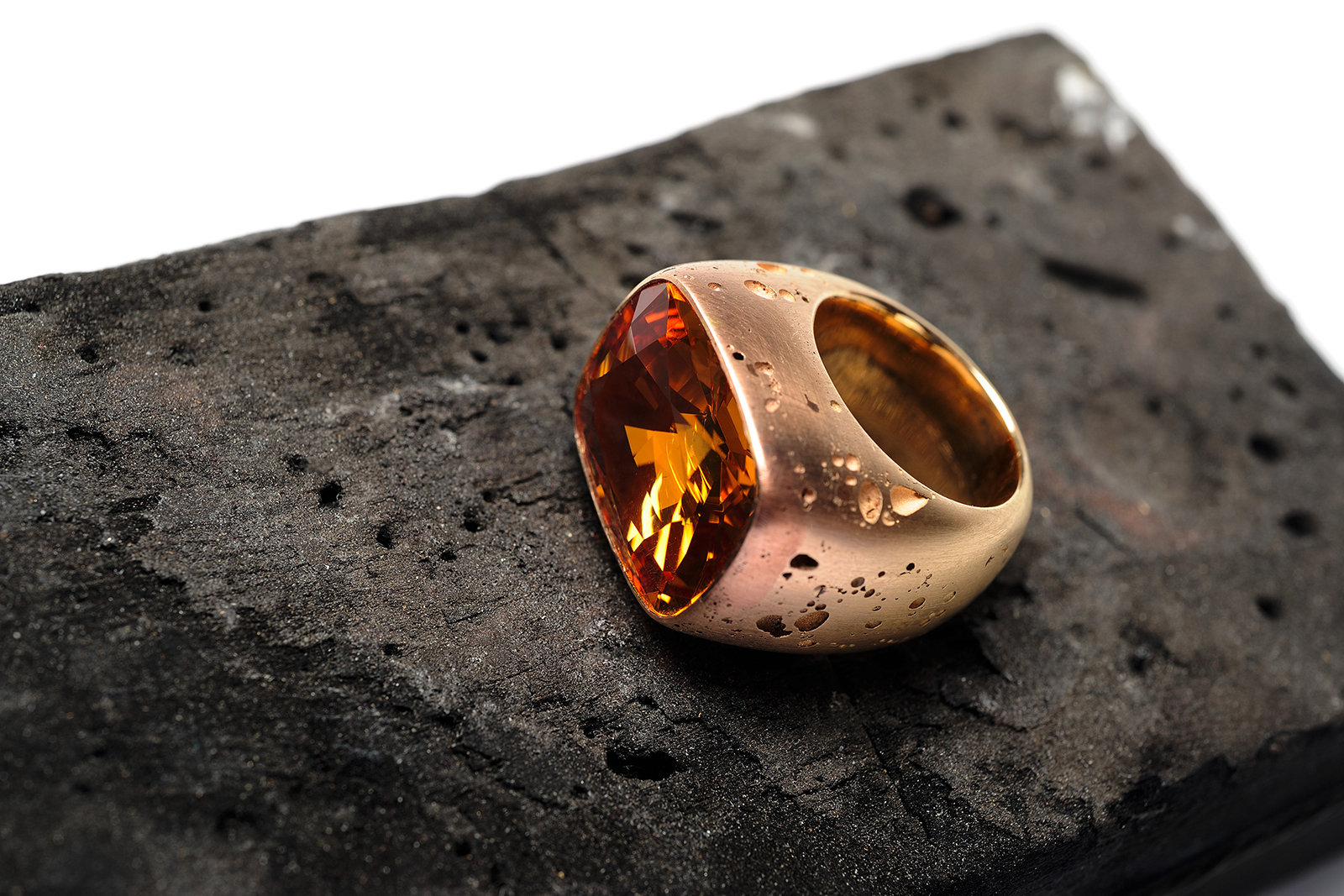 Hemmerle ring with topaz and pink gold. Images courtesy of Hemmerle