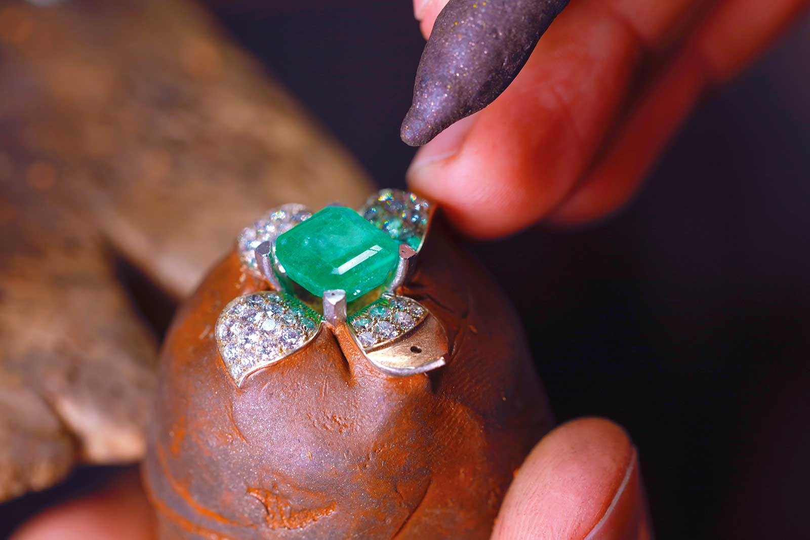 Making of the Jewellery Orchestra ‘Boa Constrictor' dis-engagement ring with 4 ct Colombian emerald, aquamarine, tsavorites, rubies, colourless and black diamonds and enamel in platinum, 18k yellow, pink and white gold
