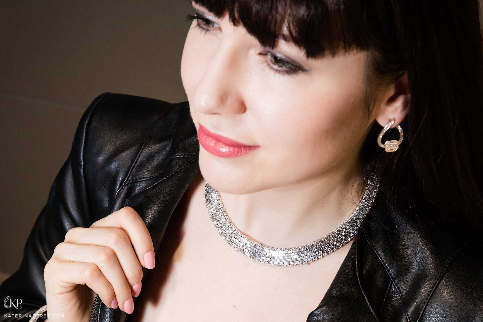 Katerina Perez wears Stenzhorn 'Antartide' diamond necklace from the 'Iced Zeit' collection with tapered baguette cut diamonds, and diamond earrings with asscher and step cut diamonds, both in 18k white gold