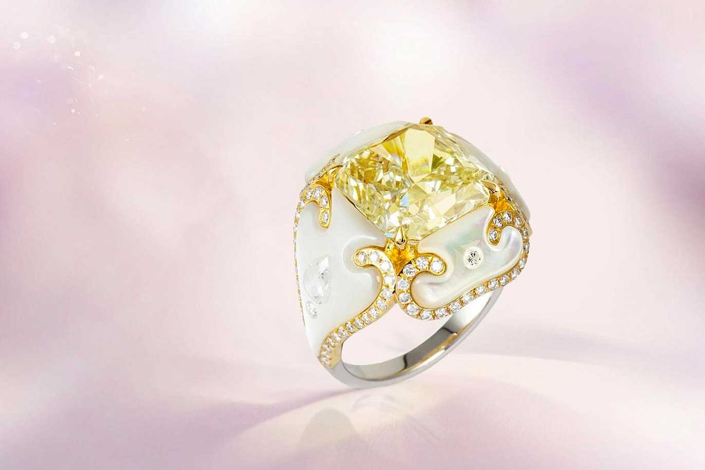 Boghossian ring with vivid yellow diamond, mother of pearl, and accenting diamonds in titanium and 18k white gold 