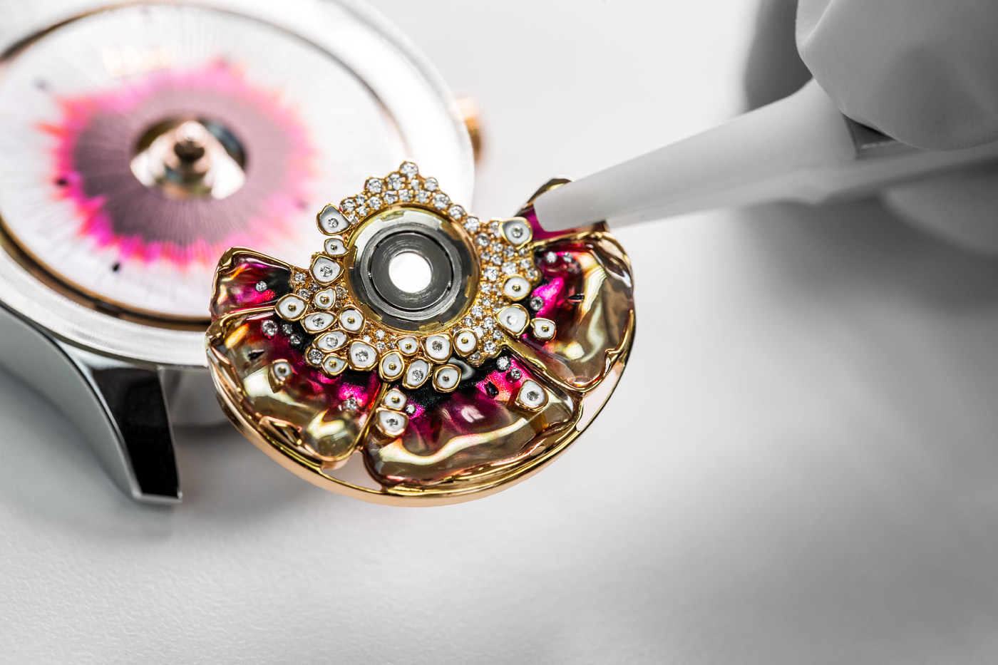  The making of the Dior ‘Miss Dior’ watch from the ‘Grand Bal’ collection with diamonds, lacquer, ceramic and 18k rose gold, and the ‘Dior Inversé 11 ½’ calibre automatic movement 