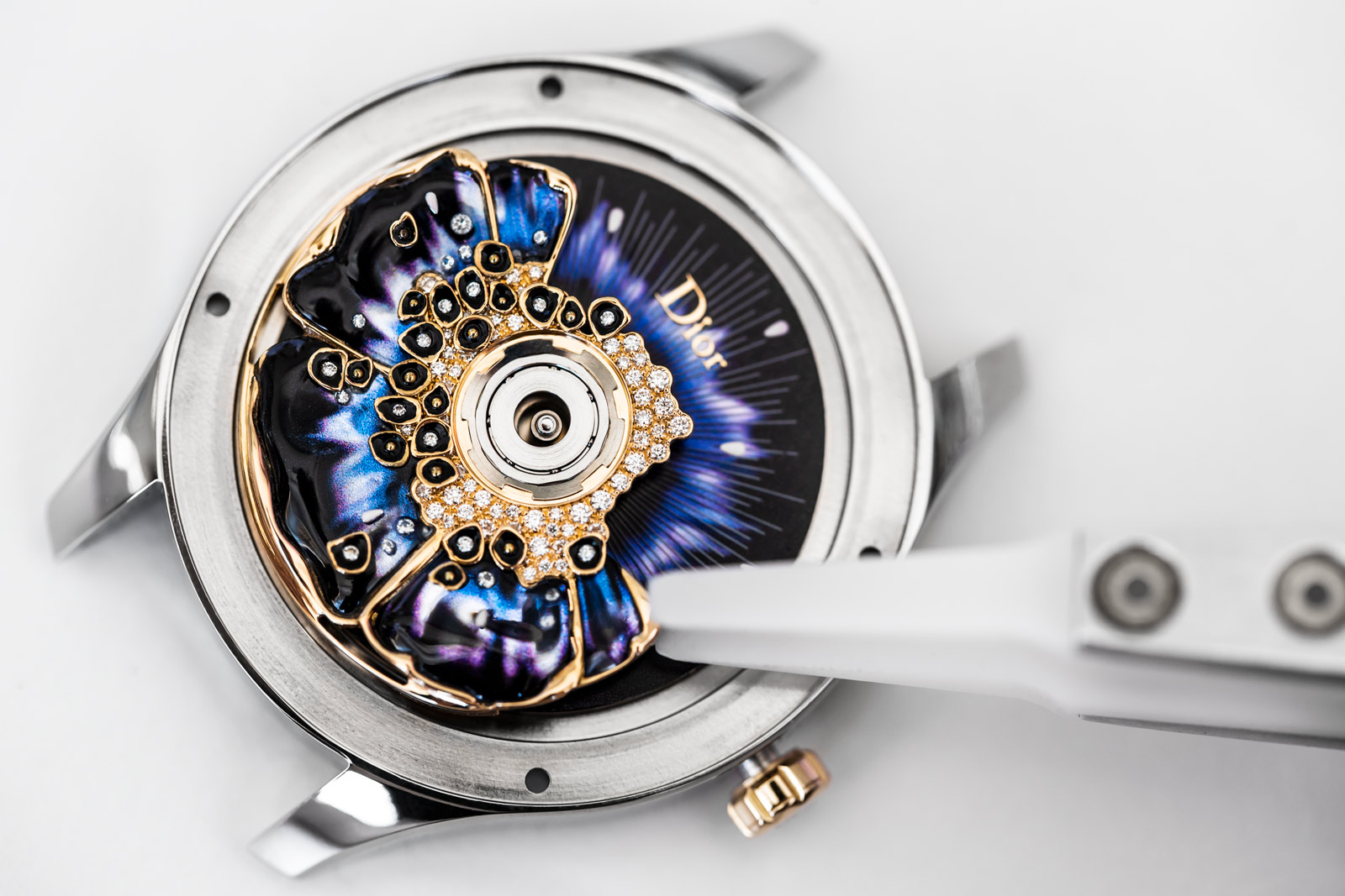  The making of the Dior ‘Miss Dior’ watch from the ‘Grand Bal’ collection with diamonds, lacquer, ceramic and 18k rose gold, and the ‘Dior Inversé 11 ½’ calibre automatic movement 