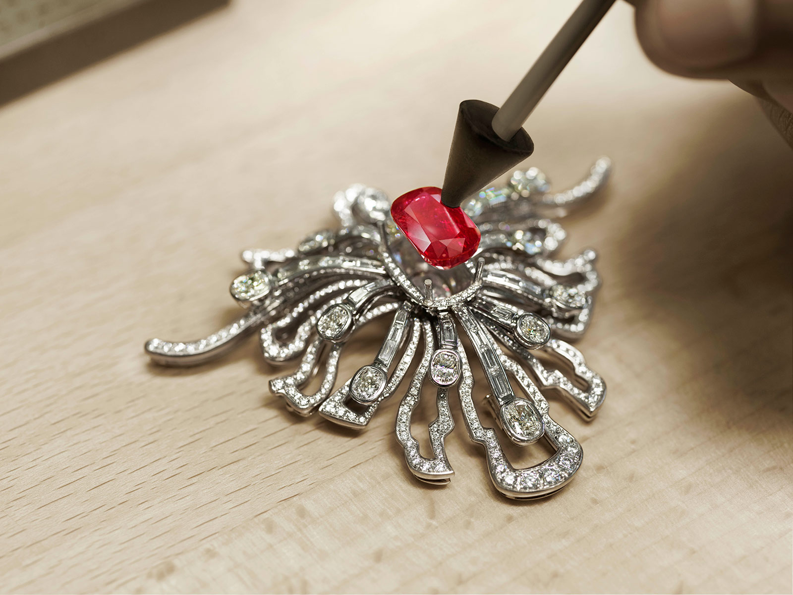 The creation of Gübelin ‘Wings of a Dragonfly’ transformable necklace with 10.64ct Burmese ruby and 13 cushion cut diamonds, 43 fancy cut diamonds and 1788 round brilliant cut diamonds totalling 19.49ct 