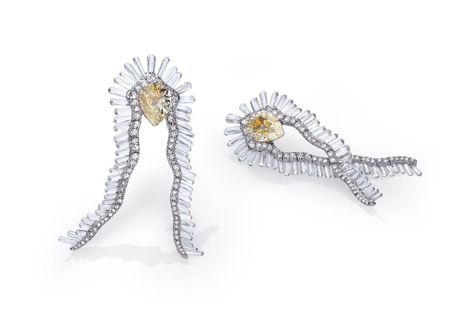 Theodoros 'Apache' earrings with pear cut fancy yellow diamonds, and colourless pencil shaped and brilliant cut diamonds in 18k white gold