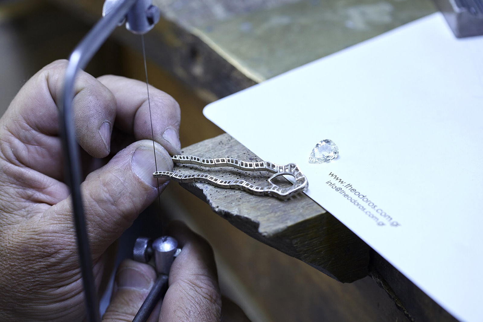  Theodoros 'Apache' earrings with pear cut fancy yellow diamonds, and colourless pencil shaped and brilliant cut diamonds in 18k white gold
