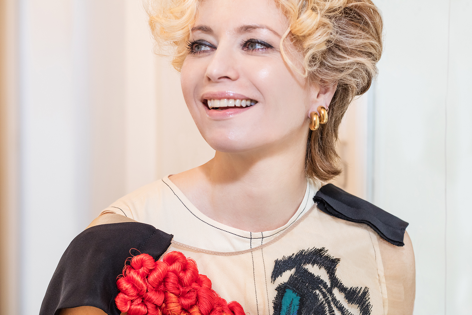 Second Pétale founder Arina Pouzoullic wearing Chaumet earrings in 18k yellow gold 