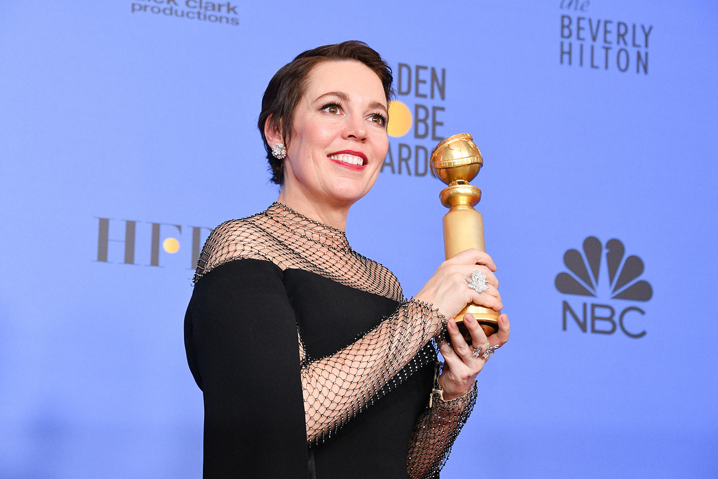 Olivia Coleman wearing diamonds ring and earrings by David Morris at Golden Globes 2019