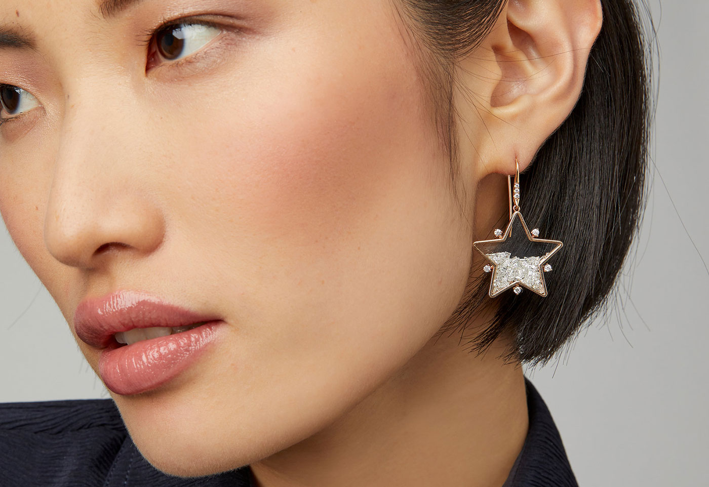 Moritz Glik star earrings with 4.08ct of diamonds set in and enclosed in white sapphires in 18k rose gold 