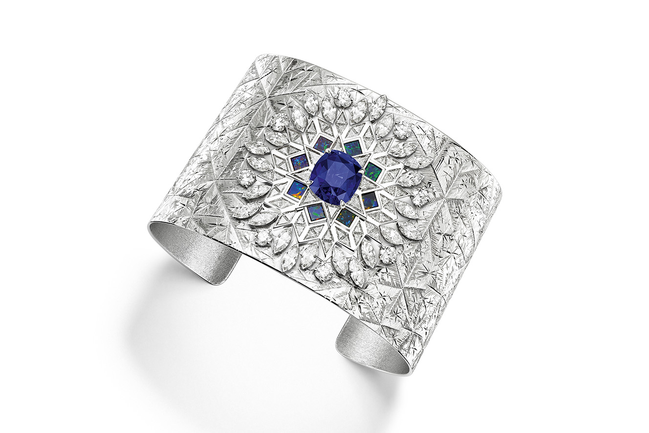  Piaget ‘Frosted Star’ Manchette with a 5.12 ct cushion cut Madagascan sapphire, square cut black opals, marquise, baguette and brilliant cut diamonds in 18K white gold