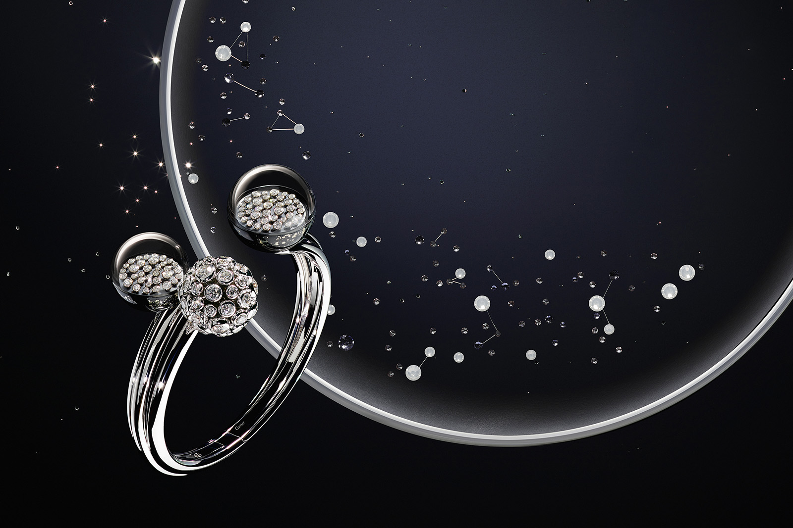  Cartier 'The Vibration of the Stars' ring from the 'Les Galaxies de Cartier' collection with diamonds in Cartier's serti vibrant 18k white gold setting 
