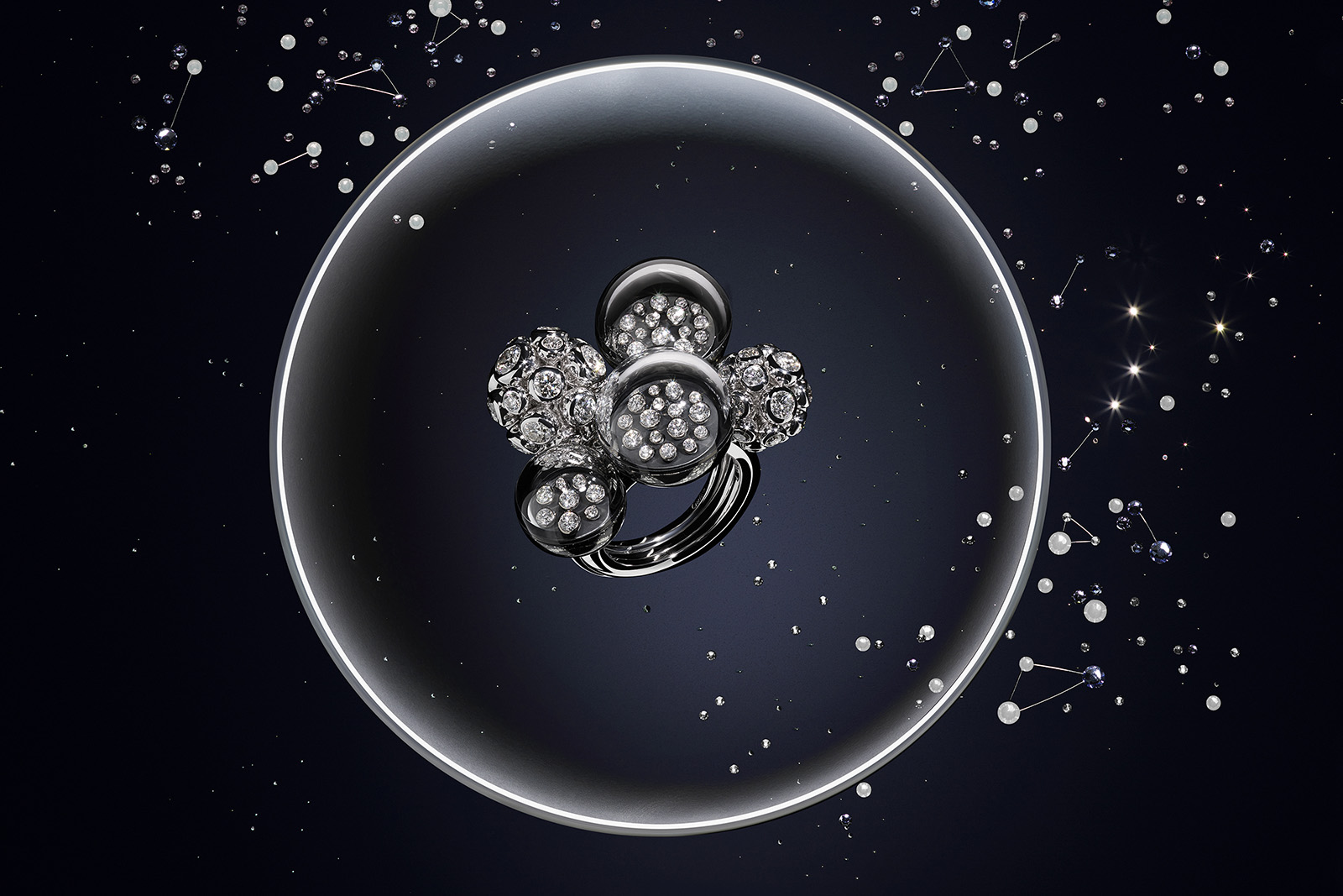 Cartier 'The Vibration of the Stars' ring from the 'Les Galaxies de Cartier' collection with diamonds in Cartier's serti vibrant 18k white gold setting 