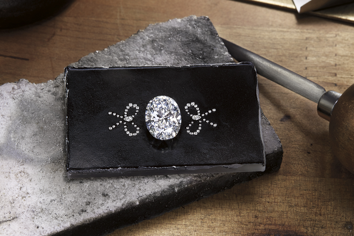  Making of Harry Winston 'Bridal Couture' engagement ring with 5.02ct oval cut feature diamond in platinum