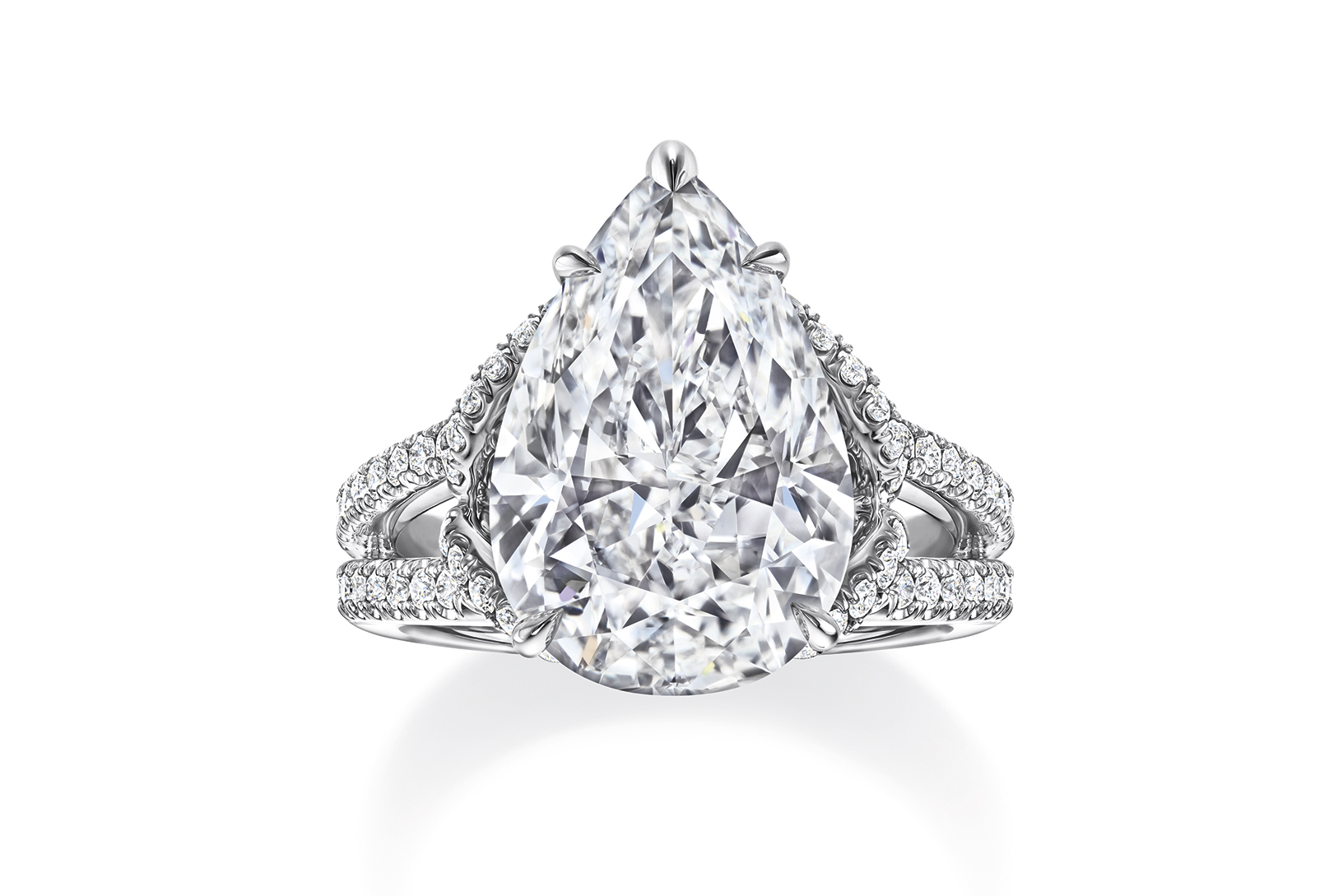  Harry Winston 'Bridal Couture' engagement ring with 5.70ct pear cut feature diamond in platinum