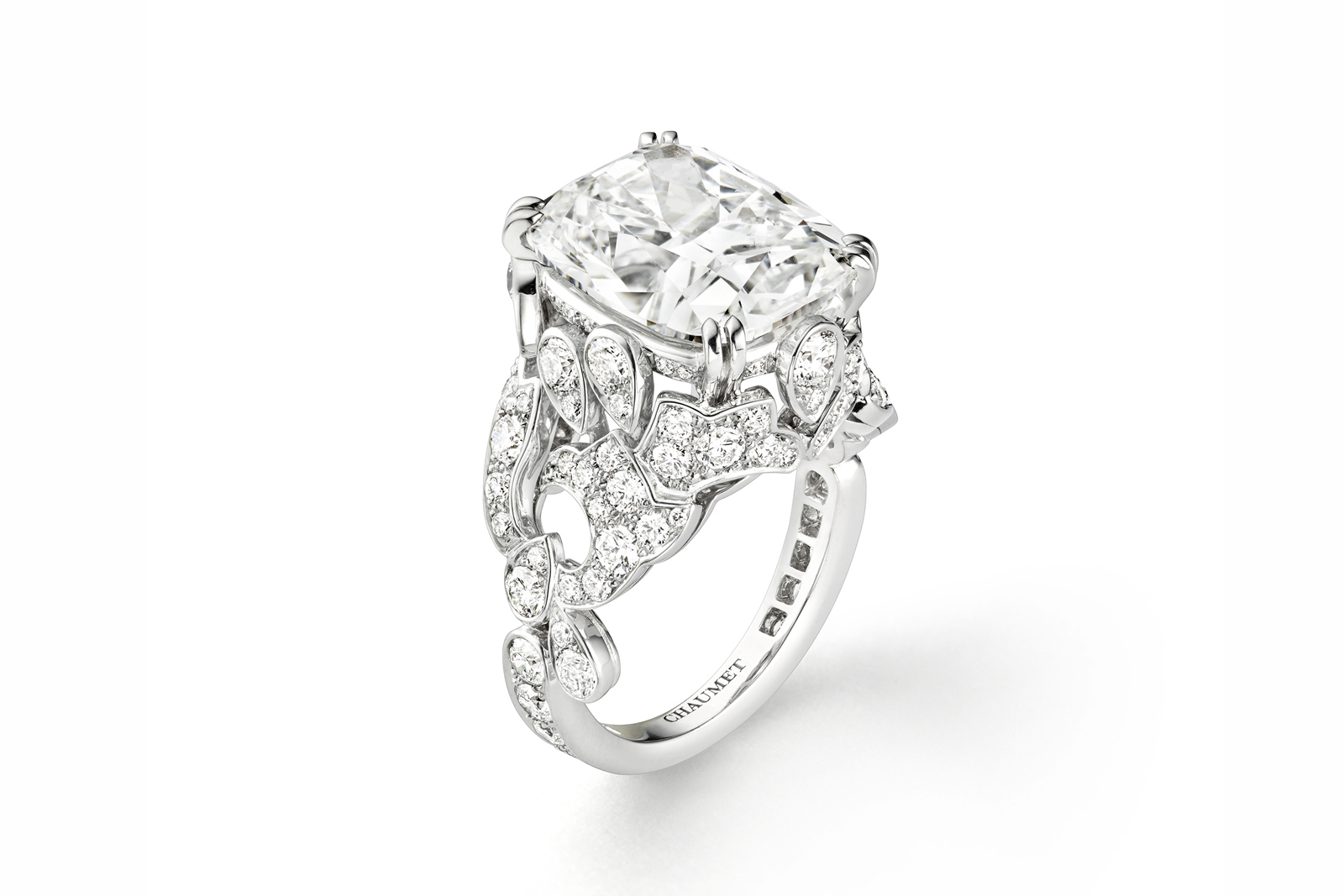  Chaumet 'Soir de Fête' engagement ring with central cushion cut diamond and accented with brilliant cut diamonds in white gold