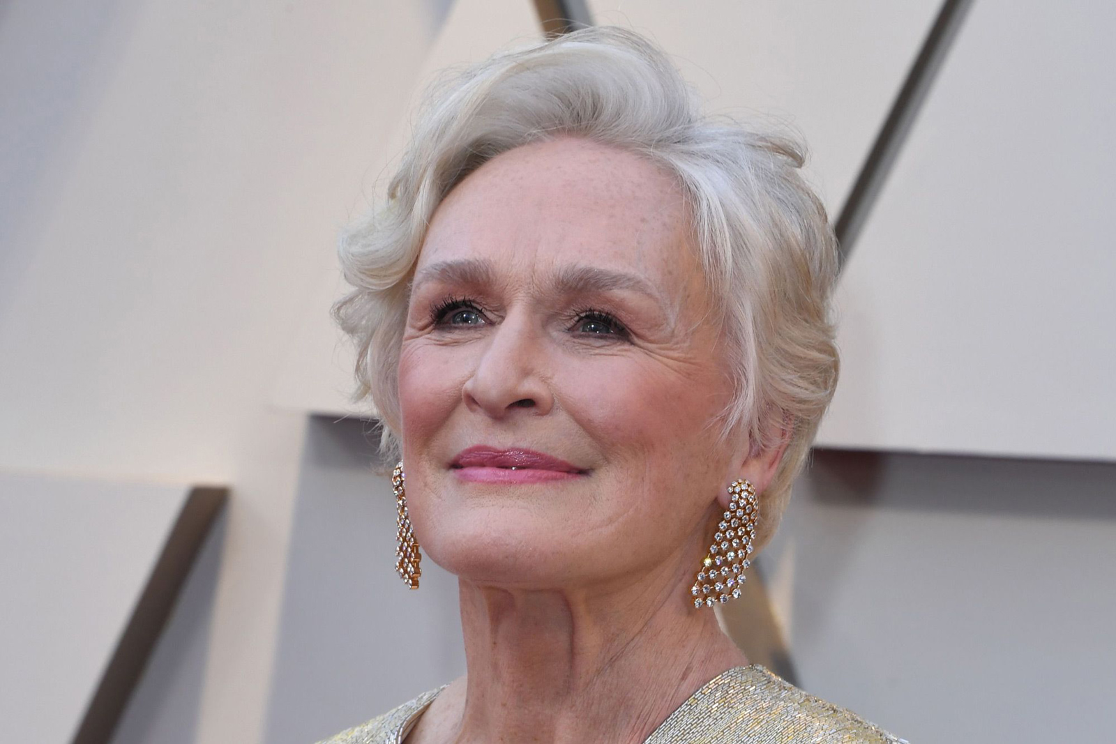  Glenn Close wearing vintage Cartier diamond earrings in yellow gold
