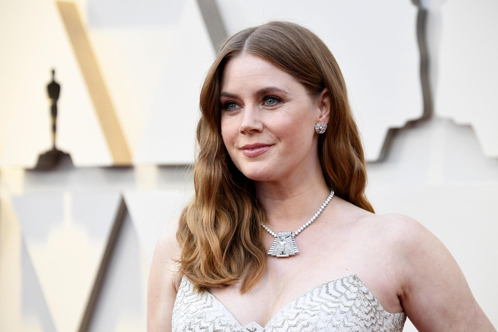  Amy Adams wearing antique Cartier diamond brooch worn clipped to a diamond tennis necklace and diamond earrings
