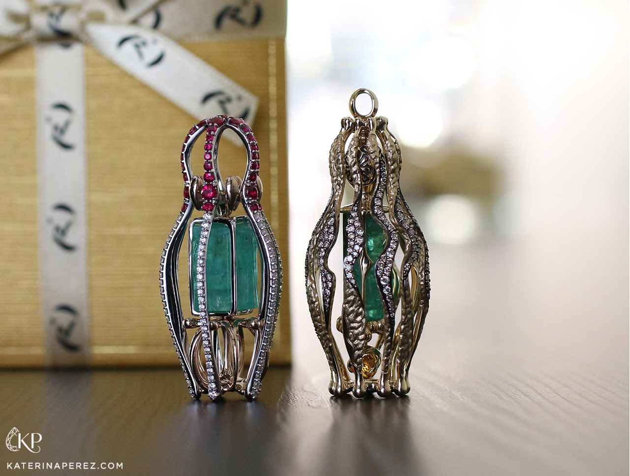 Sergey Korolyov's 'Symbols of Russia' pendant from Ringo's 'Matrena de Ural' collection with 18.04 carat Ural Mountain emerald, rubies and diamonds and 'Every Era has its Art' pendant with 18.56 carat emerald, a 1.28 carat orange sapphire and diamonds