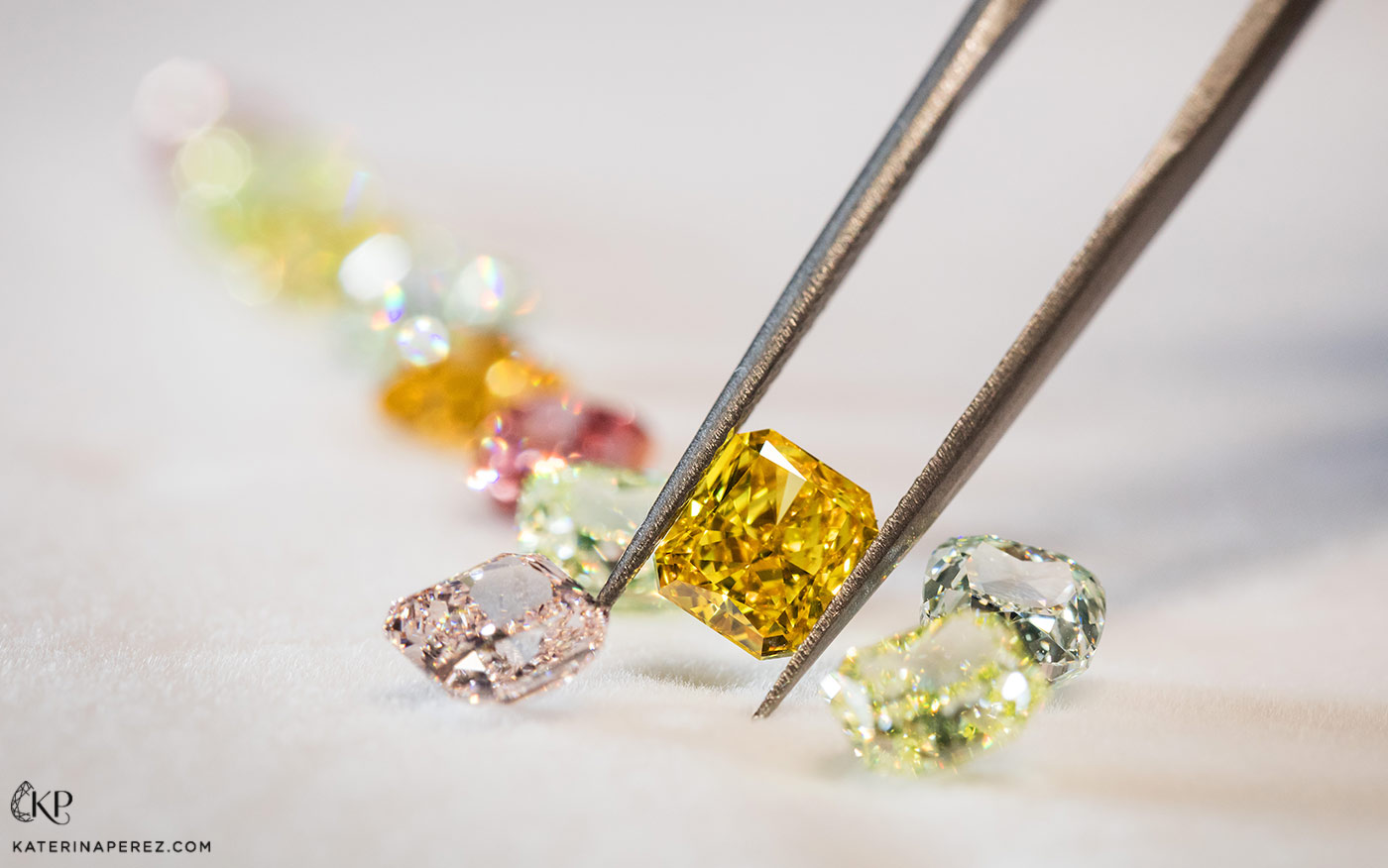 Kunming Diamonds orange cushion cut diamond. Photo by Simon Martner