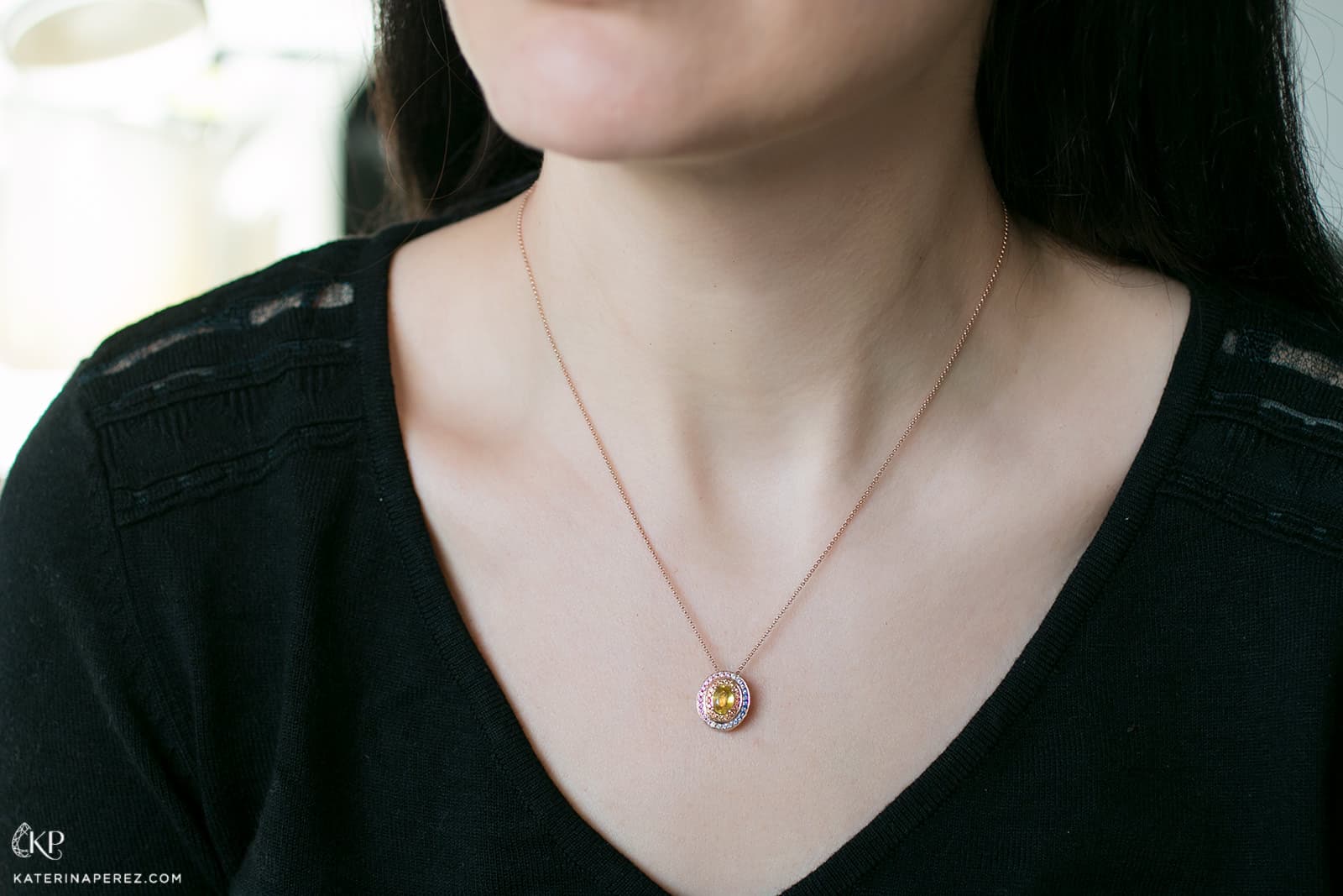  Alice Van Cal's adaptable 'Alice Eclipse' jewel with  1.15ct yellow sapphire and multi-coloured sapphires in 18k rose gold