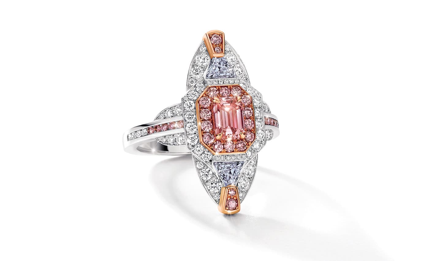  Calleija Artemis ring with 0.58ct Argyle pink emerald cut diamond in the centre and two blue trilliant diamonds