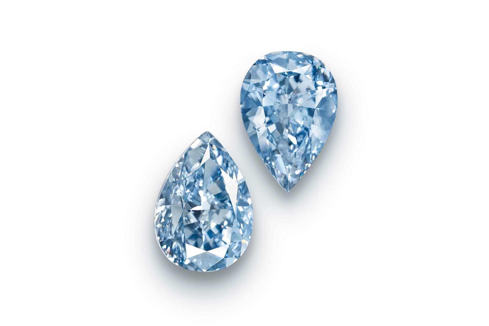 Two incredibly rare pear cut fancy vivid blue diamonds of 3.06 carats and 2.61 carats