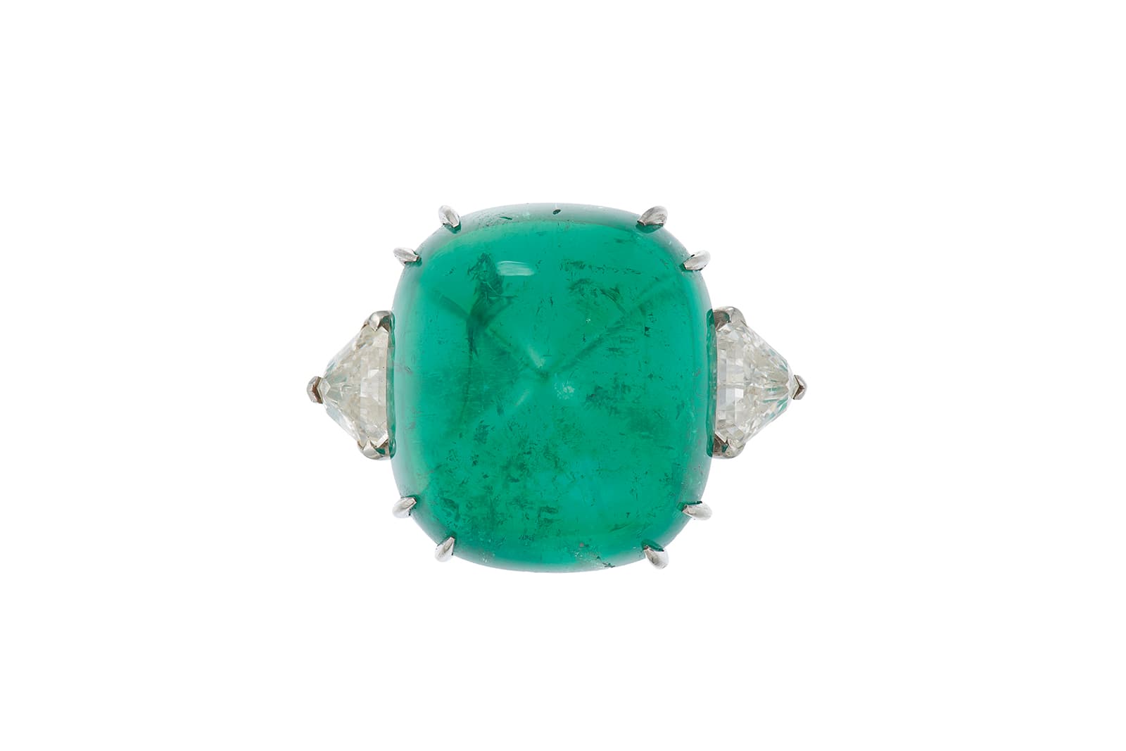  The sugarloaf cabochon emerald and diamond ring by Cartier