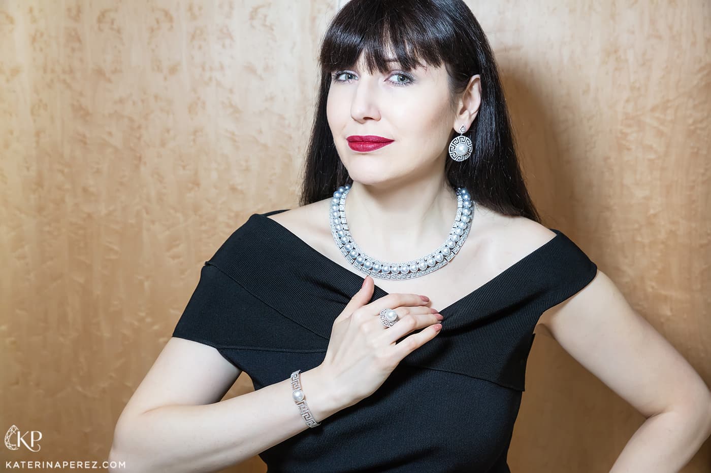  Katerina Perez wearing Autore 'Mediterranean' collection earrings, necklace, ring and bracelet, all with diamonds and South Sea pearls in 18k white gold