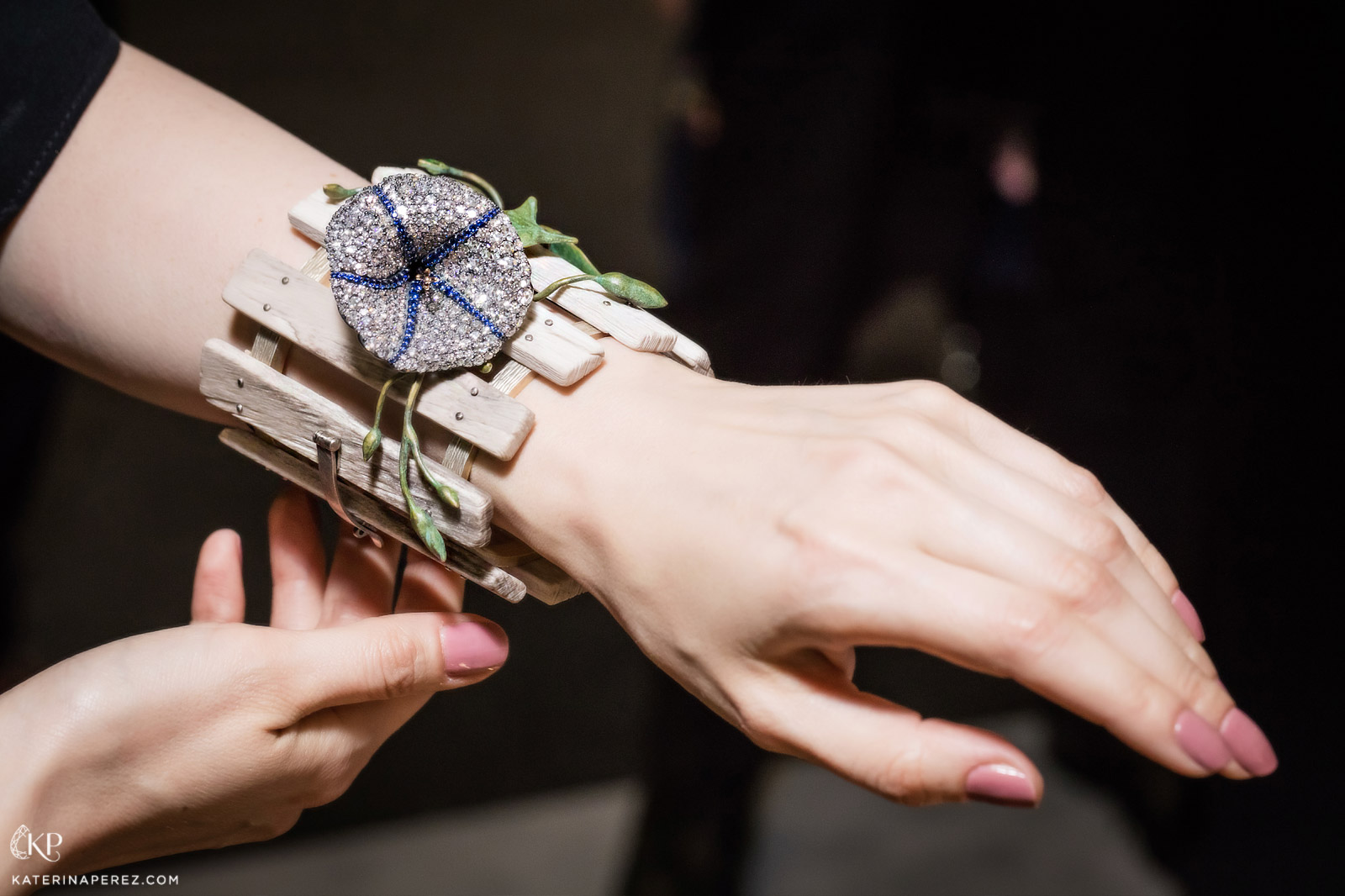 Ninotchka 'Morning Glory' cuff bracelet with petrified wood, diamonds, sapphires, demantoid garnets, gold, silver and bronze presented at Gem Geneve in 2018. Photo by Simon Martner