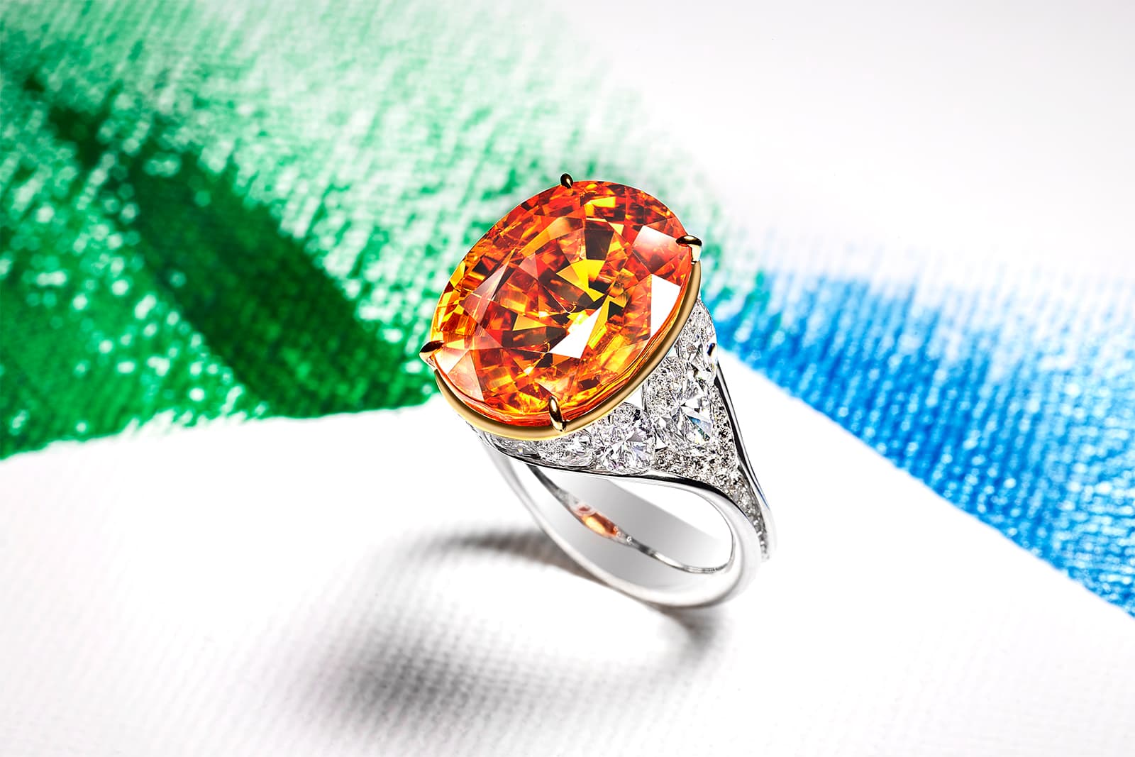 FORMS jewellery ring with oval cut mandarin garnet and marquise cut diamonds