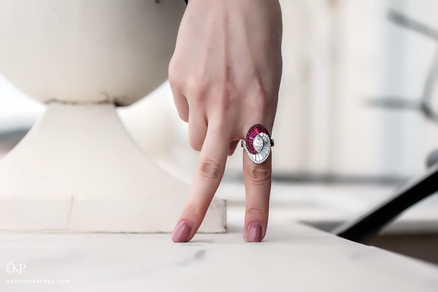  AVAKIAN high jewellery ring with marquise cut diamond, buff top rubies, mother of pearl and accenting diamonds