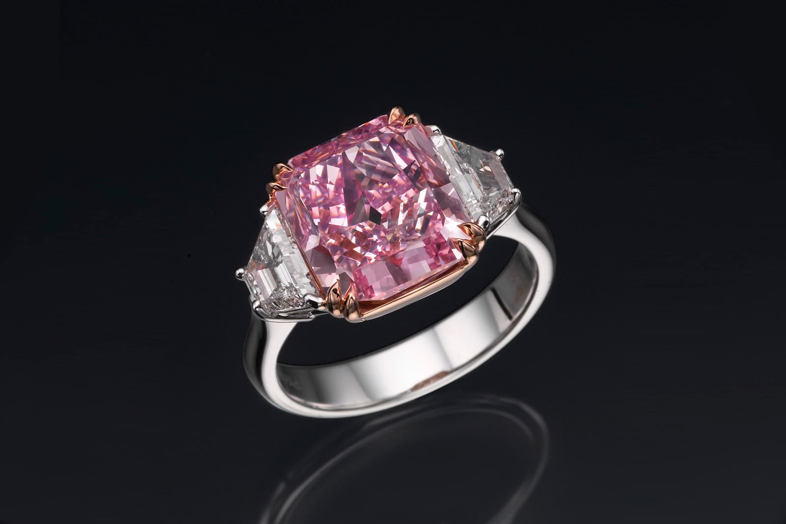  Dehres ‘Scarlet Rose’ ring with 5ct radiant shape fancy vivid pink diamond and trapezoid cut diamonds totaling 1.30ct