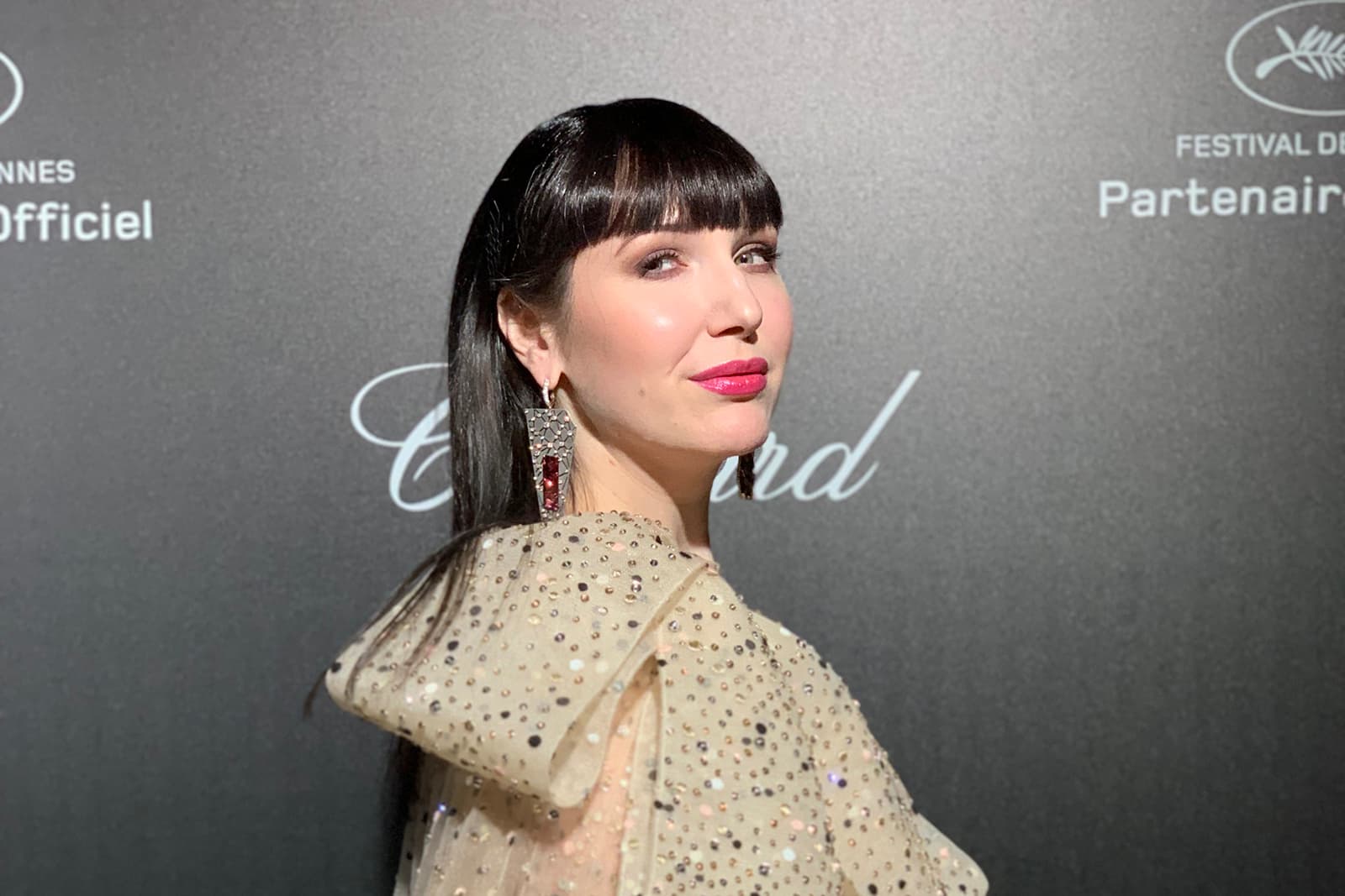 Katerina Perez wearing VMAR 'Orion &Auriga' earrings with fancy cut pink tourmalines of 17.50ct and 17.60ct, and diamonds in pink gold and titanium