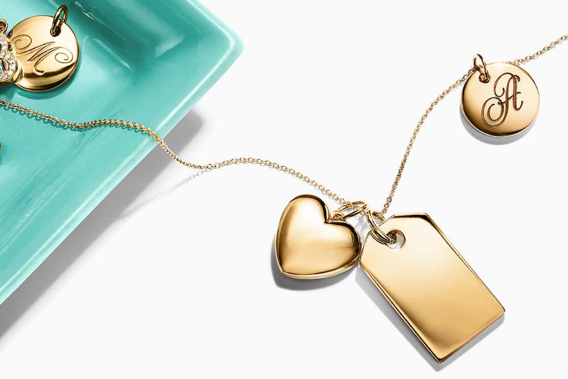 Tiffany&Co. selection of engravable pendants in yellow gold