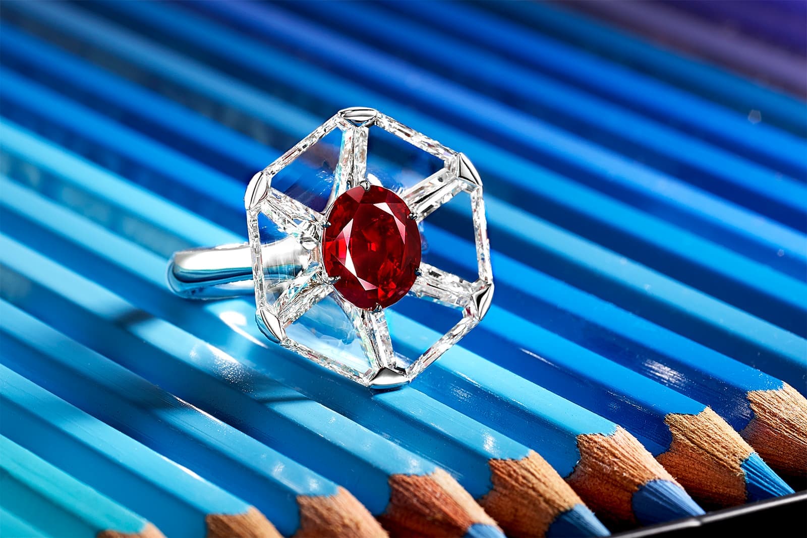  FORMS ring with pigeon blood Burmese ruby and triangular shaped diamonds in white gold