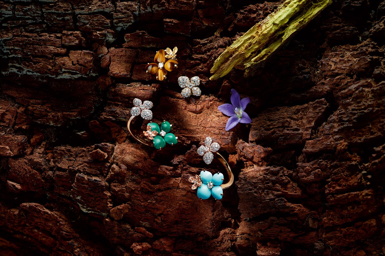 Chaumet 'Flower' rings and stud earrings with diamonds, turquoise, malachite and tiger's eye in yellow gold