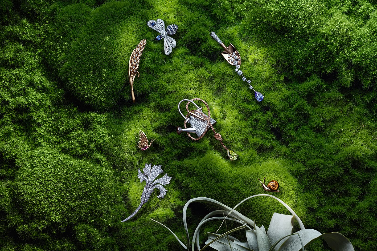  A selection of Chaumet's latest brooches with diamonds, sapphires, tanzanite, peridot and tiger's eye in yellow, rose and white gold