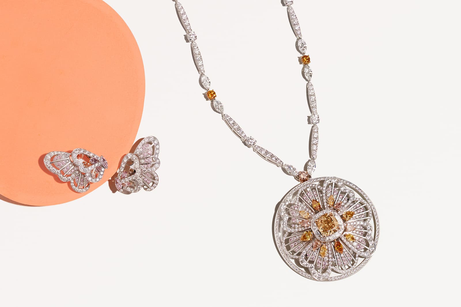De Beers 'Monarch Butterfly' medallion and earrings with fancy coloured and colourless diamonds