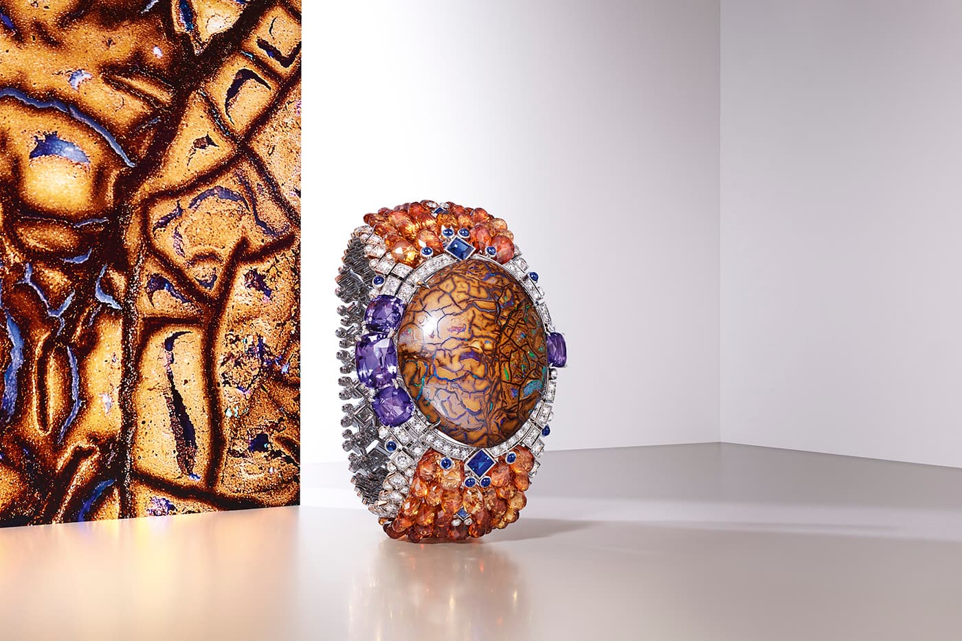 Cartier ‘Zemia’ bracelet with matrix opal, sapphires, spessatite garnets and diamonds in white gold