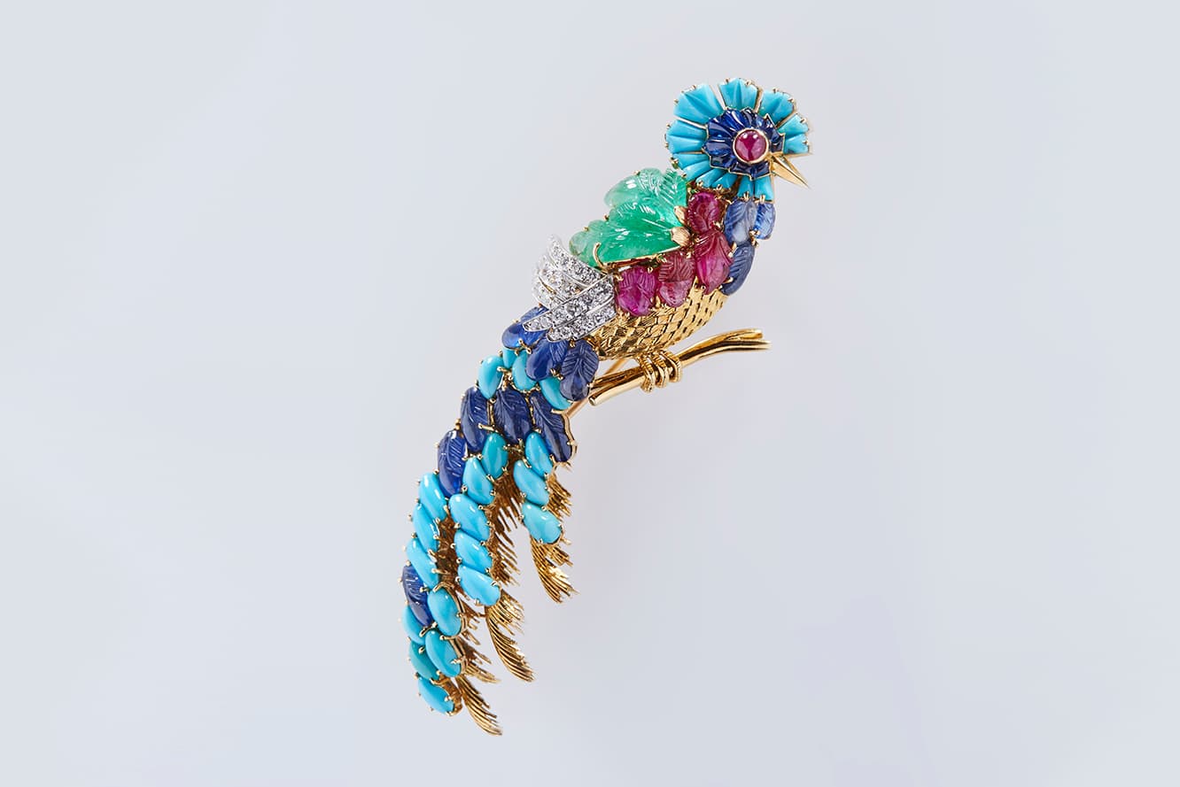  Mauboussin 'Quetzal' brooch with sapphires, emeralds, rubies, diamonds and turquoise in yellow gold circa 1960