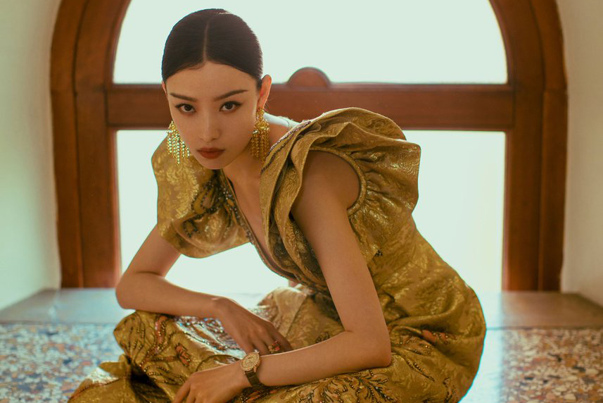  Ni Ni wearing Gucci earrings with yellow sapphires and Jaeger-LeCoultre ‘Dazzling Rendez-Vous’ watch