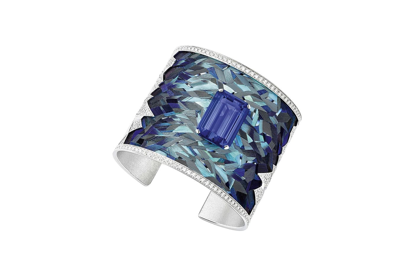  Piaget 'Blue Emotion' cuff with feather marquetry by Nelly Saunier, and 24.36ct emerald cut tanzanite and diamonds in white gold