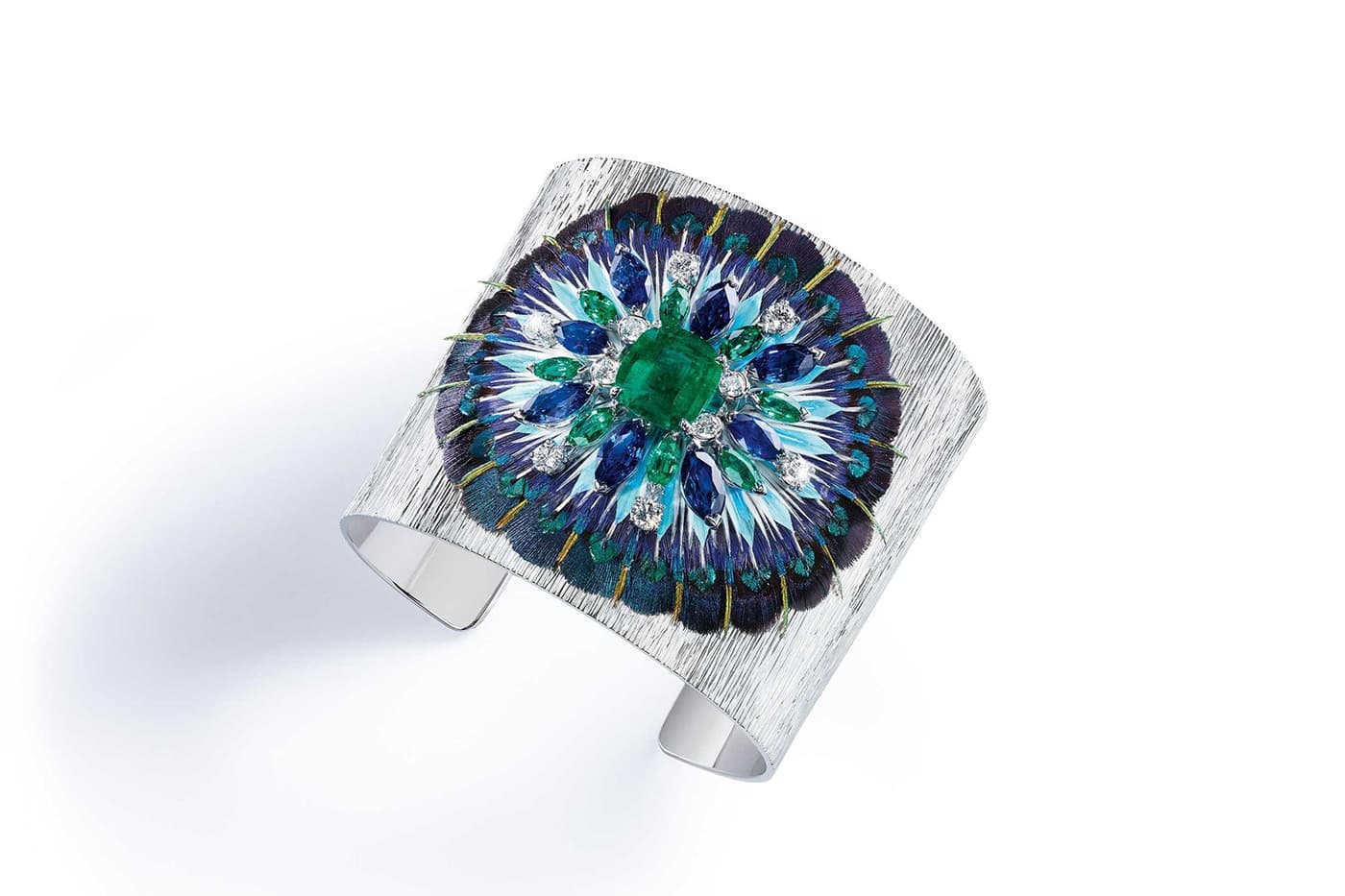 Piaget 'Serenissma' cuff with feather marquetry by Nelly Saunier, and emerald, sapphires and diamonds in white gold 