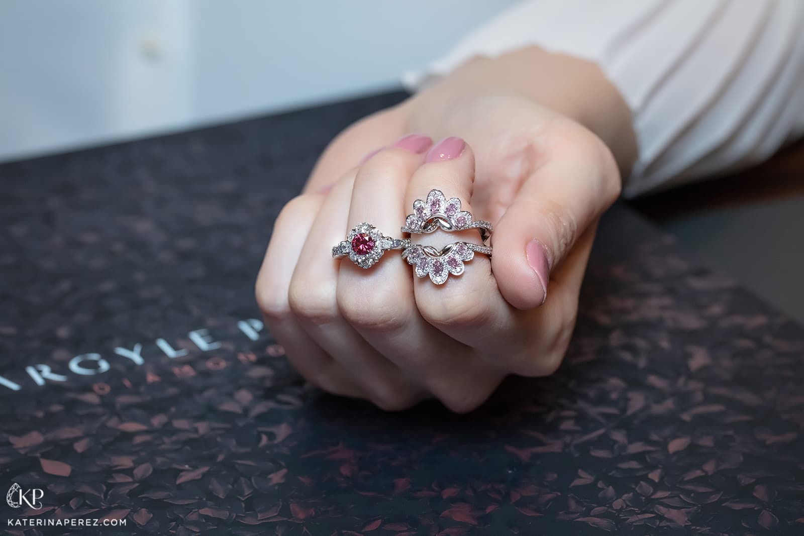 Calleija 'Couture' collection ‘Lady in Red’ ring with 0.54ct Fancy Purplish Red Argyle Tender diamond, Argyle blue and colourless diamonds, and ring jacket with Argyle pink diamonds - both in platinum and rose gold