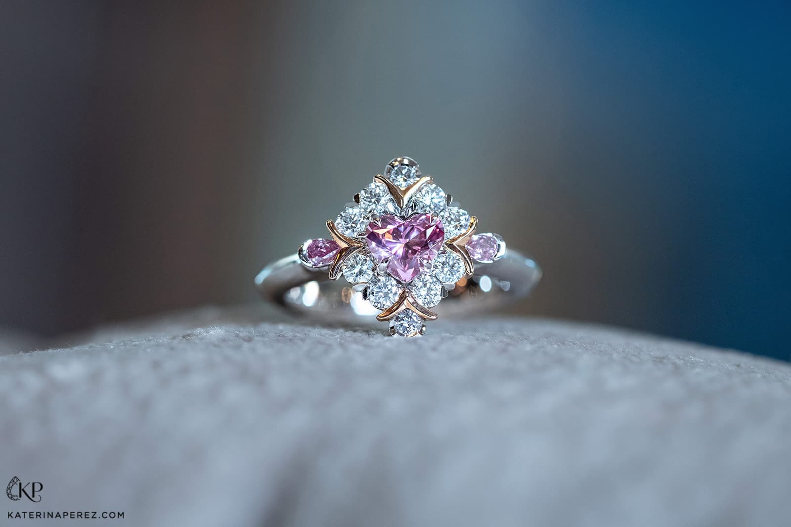 Calleija 'Couture' collection ‘Iamore’ ring with Argyle Purplish Pink Tender 0.56ct heart shaped diamond, two rare Argyle blue diamonds, Argyle pink pear shaped diamonds and colourless diamonds in platinum and rose gold
