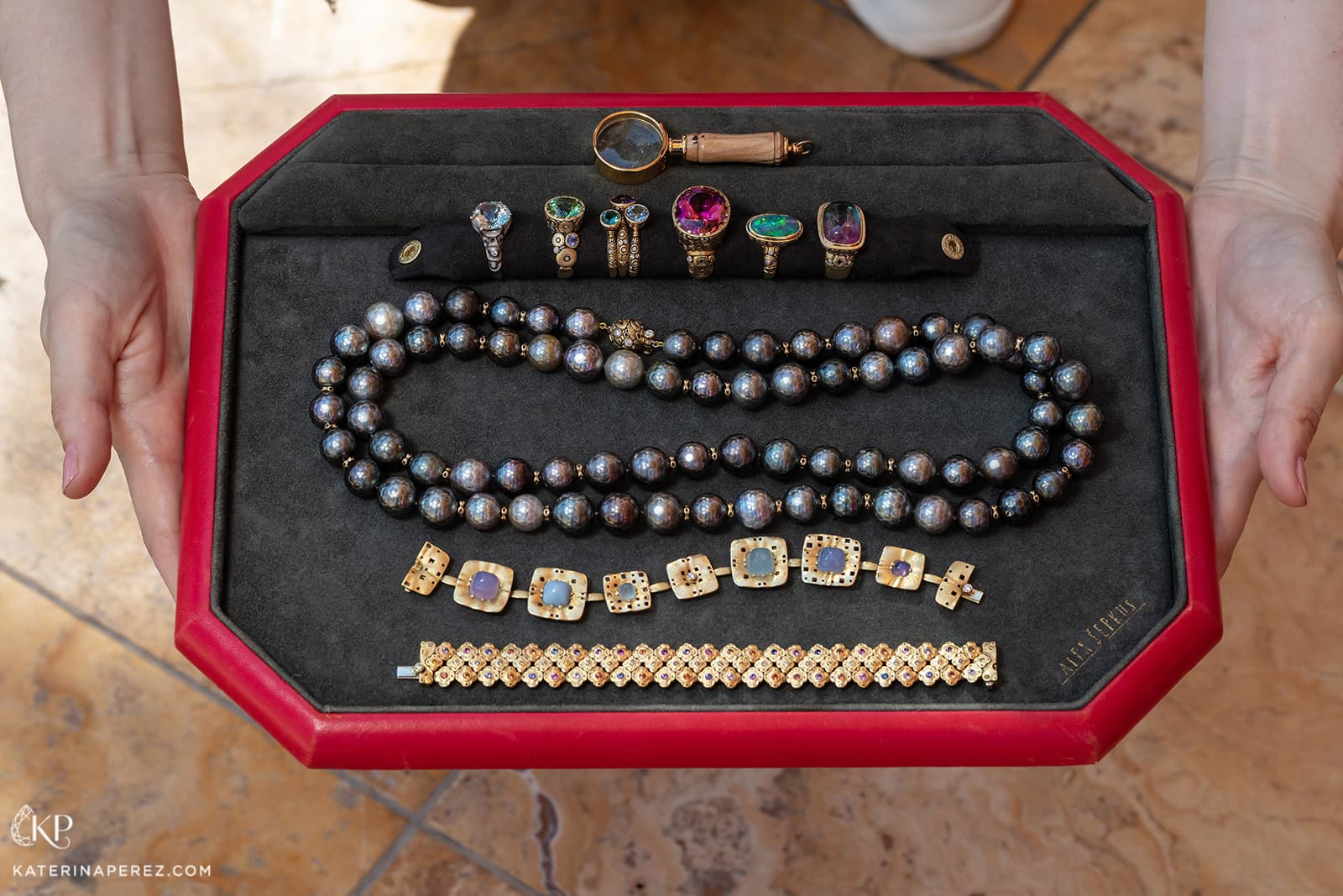 A selection of Alex Sepkus jewellery with gemstones and pearls in yellow gold