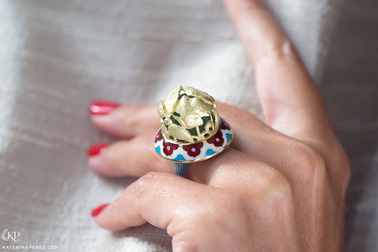  Yellow gold and hot enamel ring from Mysterious China collection that hide a jade ball under the dome. Photo by Isabella Antonio